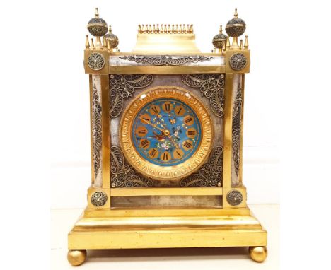 A 19th Century French Silver & Gilt Mantel Clock With Cloisonne Style Dial:Heavy cast architectural cased clock, with silvere