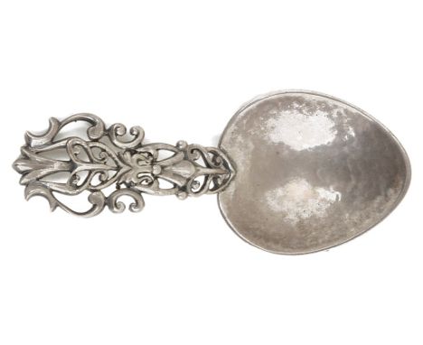 A Stylish Silver Caddy Spoon:Maker's mark SD, London 1951, with heart-shaped bowl and openwork scroll handle   CONDITION REPO