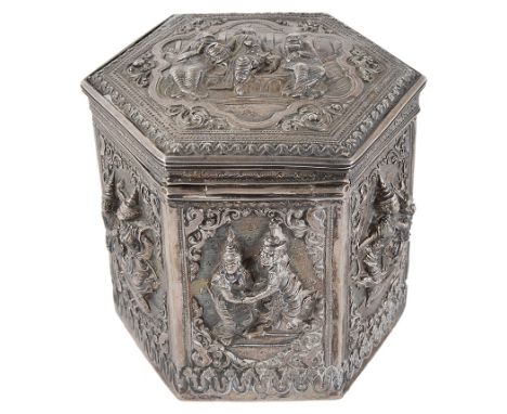 An Indian Hexagonal Silver Tea Caddy:A late 19th century Indian unmarked silver tea caddy, of hexagonal form, each panel and 