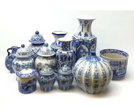 A selection of blue and white ceramics, to include a garden seat, Spode planter, Spode tea caddy, and various urns and covers