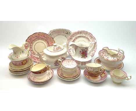 A quantity of assorted 19th century pink lustre teawares, to include tea pot, large jug, various tea cups and saucers, two sl