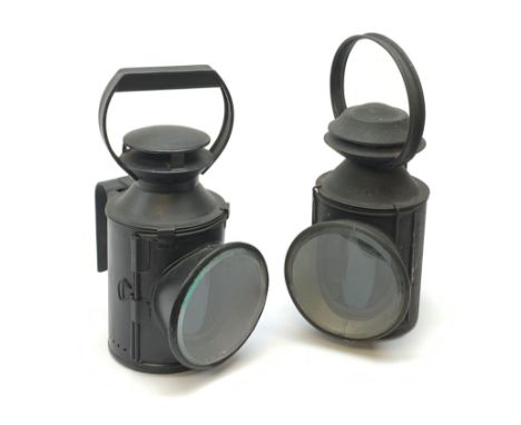 A 20th century hand held railway lamp, marked BRE for British Rail East, together with another similar later example. (2). Cl