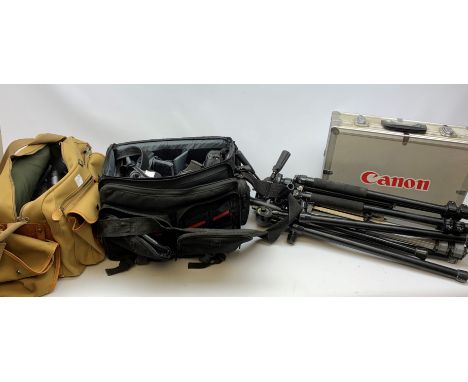 Canon EOS-1 camera body, Canon EOS-1N camera body, Tamron and Sigma camera lenses, two tripods, camera bags and various other