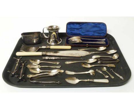 A quantity of small silver flatware comprising a boxed fork and spoons set (Victorian), seven assorted silver spoons, sugar n