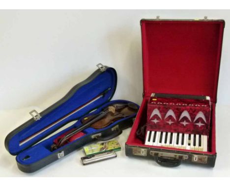 German violin in case and an accordion and a Hohner Echo harpmouth organ.  No condition reports for this sale.