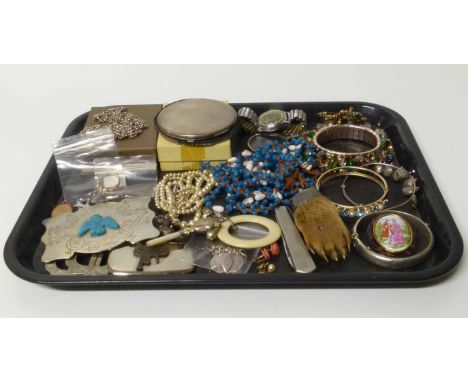 A quantity of assorted costume jewellery to include a silver three penny bangle, silver bangle, white metal items etc. No con