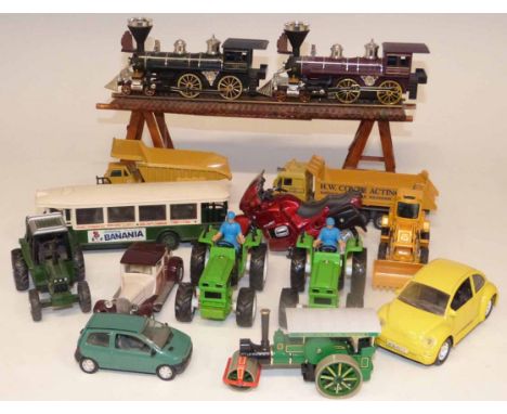 Train viewing trestle, two SS trains, Solido Renault bus and three tractors etc. No condition reports for this sale.