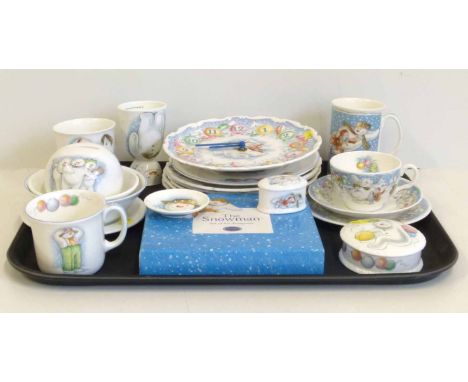 Collection of Royal Doulton Snowman tableware, to include seven plates, a trio, set of teaspoons, money box, two lidded boxes