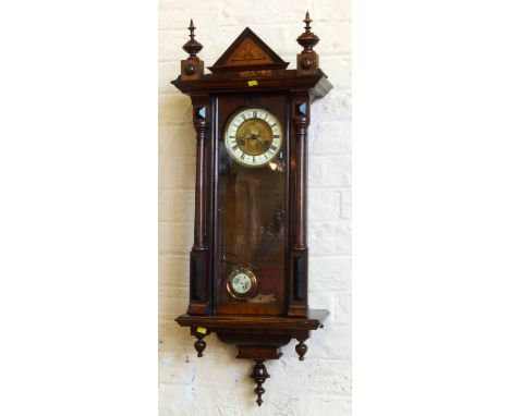 Victorian 8-day wall clock. No condition reports for this sale.