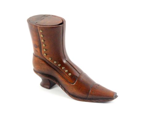 A large late 19th Century mahogany table snuff box in the form of a lady's boot, carved details, flattened toe cap, brass stu