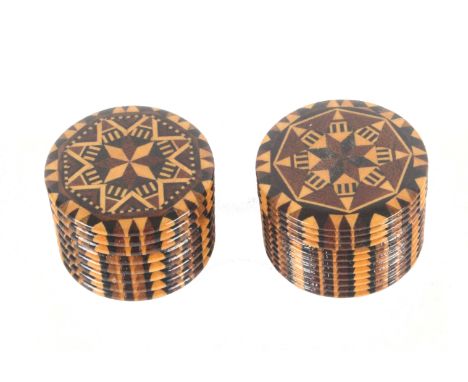 A near pair of rib turned rosewood stick ware cylinder boxes, each with screw-off stick ware lid, 3.2cms dia. &nbsp; &nbsp; (