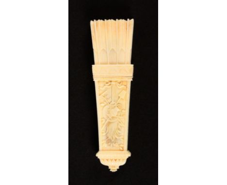 A fine 19th Century French carved ivory needle case in the form of a quiver of arrows, the top section carved as feathers and