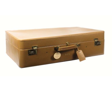 Asprey - London, a light tan leather suitcase, unused, rectangular, brass Sesamee combination locks set at 000, initialled 'G