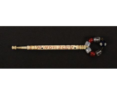 A scarce bone hanging bobbin, spot inscribed in red 'W. Worsley Hung 1868', attributed to 'Bobbin Brown'. &nbsp; &nbsp; &nbsp