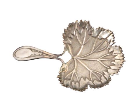 A silver caddy spoon, the leaf form bowl, possibly a maple leaf, on short handle incorporating a vacant oval cartouche, Birmi