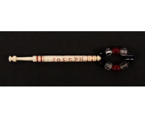 A scarce bone hanging bobbin, spot inscribed in red and black 'Joseph Castle Hung 1860' attributed to the 'blunt end man'. &n