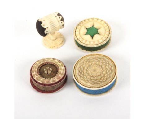 Four 19th Century bone and ivory pin cushions, comprising three of disc form, two with open centres, all with engine turned d