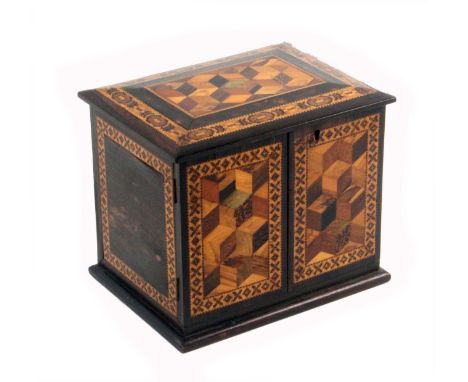 A Tunbridge ware coromandel wood casket by Thomas Barton, the cushion form rectangular top with a panel of cube work within a