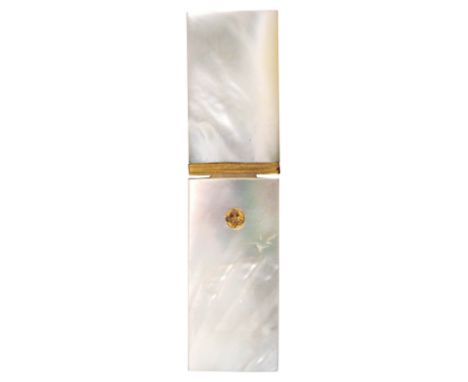 A Palais Royal mother of pearl needle case, of plain rectangular form, one side with a circular gilt and enamel pansy motif, 