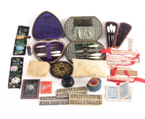 A mixed lot - sewing, comprising a leather heart shaped sewing case with seven tools, 14cms, another of curved end rectangula