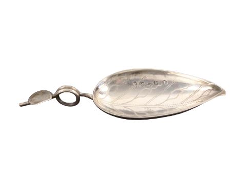 A silver caddy spoon, the leaf shaped bowl appropriately dot engraved, the wire encircled handle with a smaller offset leaf, 