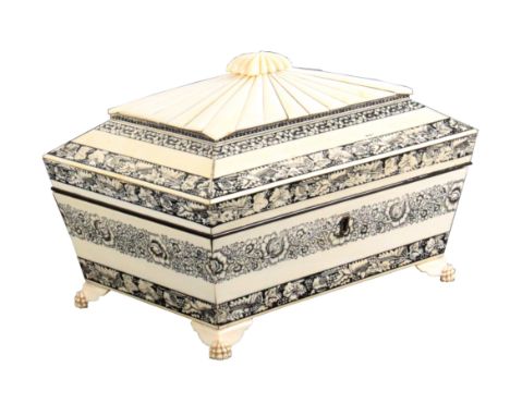 A fine Anglo-Indian ivory veneered sewing box, Vizagapatam, circa 1820, of sarcophagal form engraved with floral and other ba