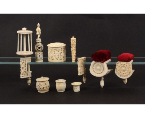 A mixed lot of 19th Century Chinese carved ivory and bone pieces, comprising three various clamps and a part clamp, largest 1