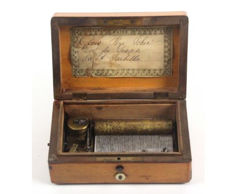 A French 19th Century musical box, the rectangular satinwood box with burr mulberry inlaid lid, the interior lid with printed