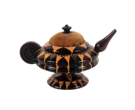 A good Tunbridge stick ware pin cushion in the form of a tea pot, the domed velvet cushion with turned finial, 6.5cms. &nbsp;