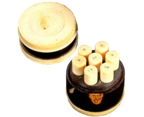 A fine early 19th Century lignum vitae and ivory mounted multiple needle box, of cylinder form with engine turned ivory top, 