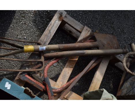 QTY OF PRUNING SAWS AND A FORK AND SPADE