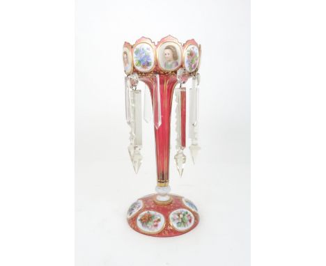 A 19TH CENTURY BOHEMIAN CRANBERRY AND WHITE CASED GLASS LUSTRE the castellated rim with alternating portrait panels of childr