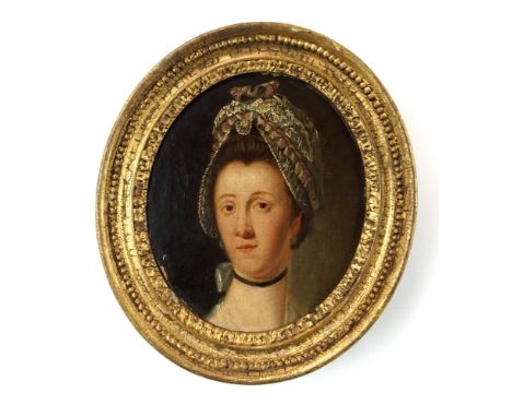 BRITISH SCHOOL (18TH/19TH CENTURY) PORTRAIT OF A GENTLEMAN IN A BLUE JACKET; PORTRAIT OF A LADY IN A SILK BONNET Oil on canva