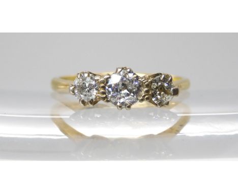 AN 18CT THREE STONE DIAMOND RING  set with estimated approx 0.60cts of brilliant cut diamonds. Finger size Q, weight 2.5gms C