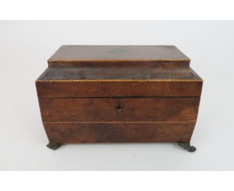 A REGENCY TWO DIVISION TEA CADDY with hinged lid and&nbsp; with burr walnut lidded compartments with mixing bowl on claw feet
