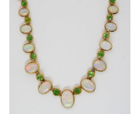 A 15CT GOLD OPAL AND DEMANTOID GARNET NECKLACE  the largest opal measures 10.5mm x 7.1mm x 2.27mm, smallest 5mm x 3.5mm x 1.4