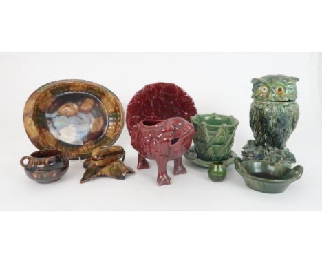 A DUNMORE POTTERY OWL TOBACCO JAR  with later replacement head, a grotesque toad spoon warmer, a bread plate and other pieces