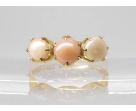 A SCOTTISH RIVER PEARL RING the three button pearls in shades of pink are set into a classic crown mount, the shank stamped 9