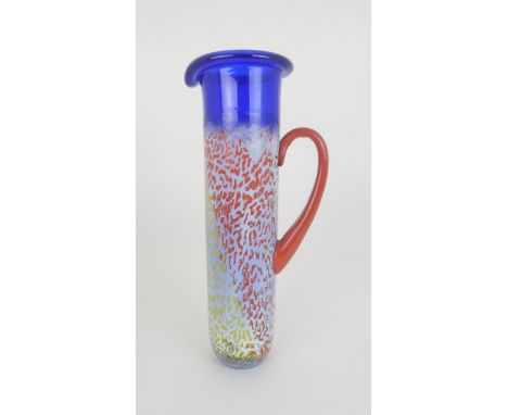 A KJELL ENGMAN (b. 1946) FOR KOSTA BODA HELIOPORA SERIES PITCHER the blue glass with mottled orange and yellow on white, sign