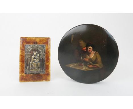 A PAPIER MACHE CIRCULAR SNUFF BOX  the lid decorated with a courting couple in a tavern, 10cm diameter and a Ricordo mad del 