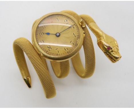 AN UNUSUAL 18K GOLD SNAKE BRACELET WATCH the sprung body of the snake holds a ladies watch stamped with the Swiss 18ct gold H