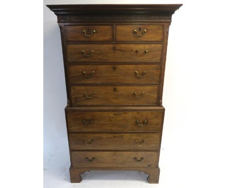 A GEORGE III MAHOGANY SECRETAIRE CHEST ON CHEST the dentil cornice above blind fretwork frieze, two short and three long draw