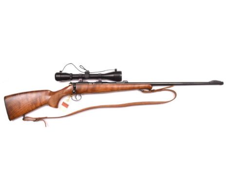 **A .22” LR Czech BRNO Mod 2-E bolt action box magazine sporting rifle,  number 387764, the pale walnut stock with chequered 