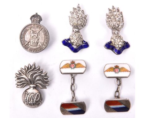 A pair of enamelled RAF cuff links, marked “silver”; a small silver “Regular Army Reserve of Officers” lapel badge, HM JF B’h