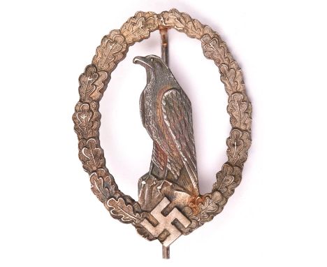A Third Reich Former Pilot’s Commemorative badge,  silver washed with grey eagle and round pin. GC 