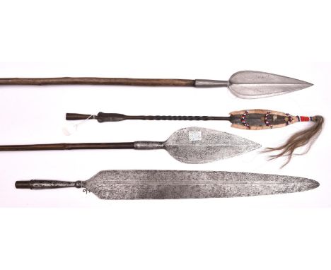 A large paddle spear blade  27” x 3½” (max) with knop on to 5” socket, shallow offset central fullers; a Sudanese leaf shaped