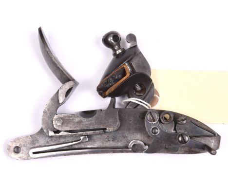 A good detached lock from a Manton flintlock carbine,  the plate engraved with a crown and “WR” over “Tower”, date “1836” and