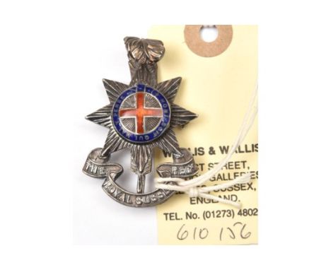 An Officer’s enamelled silver cap badge of The R Sussex Regt, HM JRG &amp; Co B’ham 1932, brooch pin; the Garter is upside do