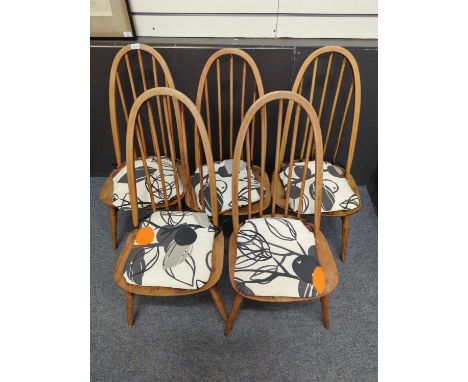 5 Ercol 'Quaker' model 365 dining chairs, partially stripped darkwood with tie-100on cushionsAll chairs are structurally soun