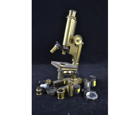 Brass microscope by R &amp; J Beck Ltd, London; ht 32cms, with extra lenses &amp; mirror